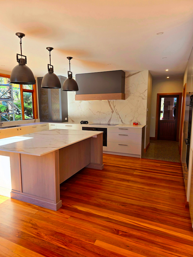 Kitchen with high-gloss polyurethane sheen on freshly sanded and polished timber flooring