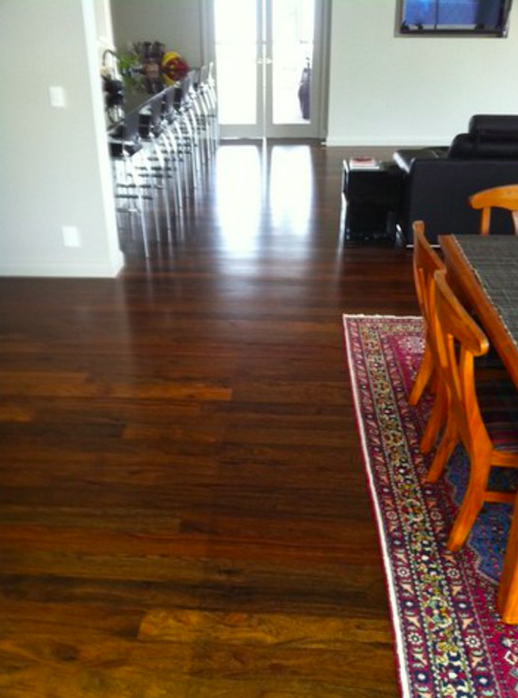 Dark stained timber floor after a colour change during wooden floor restoration