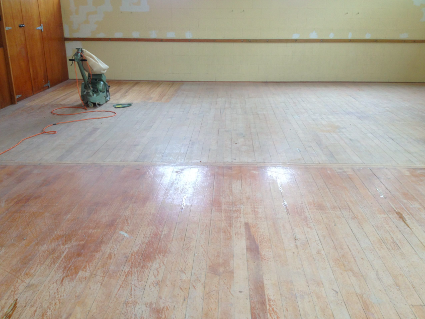 Worn timber floorboards before sanding hardwood floors